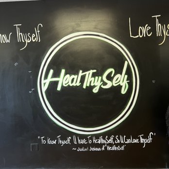Healthyself Healthy Mixes - a woman standing in front of a chalkboard - Herbal Shops Near Me - Henrico, Virginia