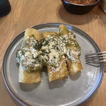 Mariposa - a plate of enchiladas on a table - Mexican Near Me - Newark, Ohio