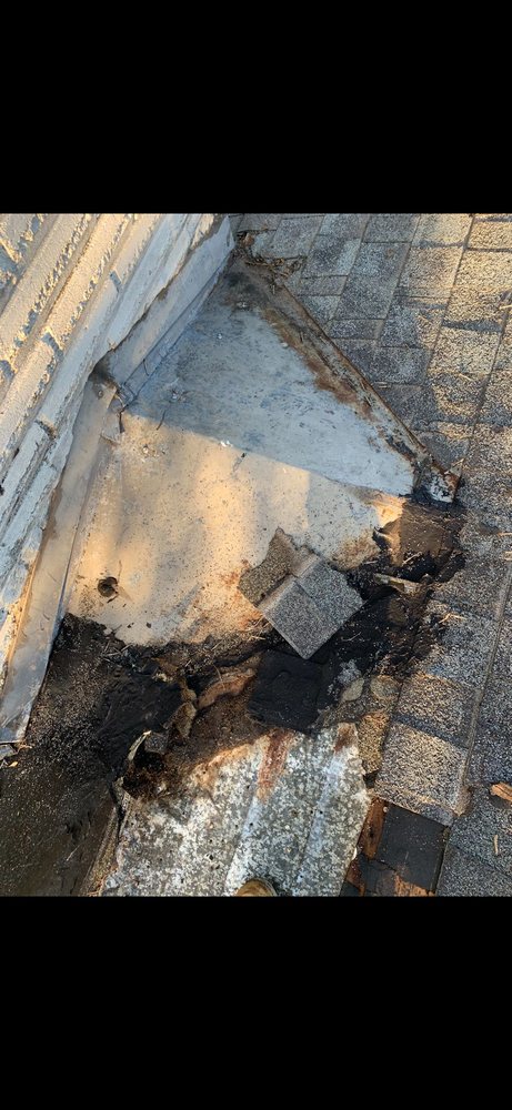 Slide of Quantum Roofing and Construction