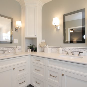 RemodelUp - Custom Cabinetry with Caesarstone Counter top, under mount kohler sink, toto faucets, kohler mirror and top knobs - Interior Design Near Me RemodelUp - Custom Cabinetry with Caesarstone Counter top, under mount kohler sink, toto faucets, kohler mirror and top knobs - Interior Design Near Me