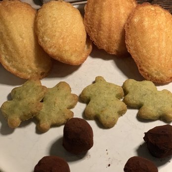 Bacchanalia - complimentary madeleines, cookies, chocolate truffles - New American Near Me - Atlanta, Georgia