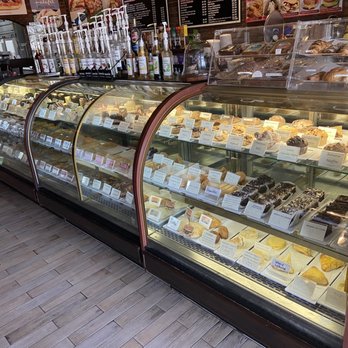 World Of Coffee - Featuring the many different desserts and pastry items as well as their large selection of flavored syrups. - Coffee & Tea Near Me - Orlando, Florida World Of Coffee - Featuring the many different desserts and pastry items as well as their large selection of flavored syrups. - Coffee & Tea Near Me - Orlando, Florida