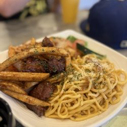 District 5 - Lomo saltado with garlic noodles