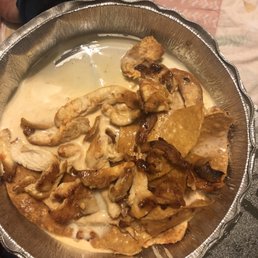 LARGE to go chicken fajita nachos. LARGE to go chicken fajita nachos.