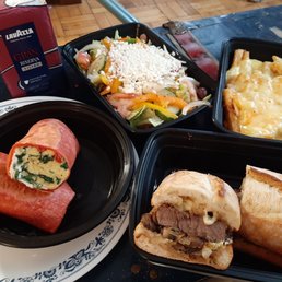 Breakfast wrap, breakfast poutine, steak sandwich and greek salad. They also let me buy a bag of their coffee!