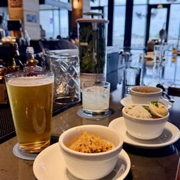 Crabby Rice and smoked Duck Gumbo. Skinn5 margarita and beer