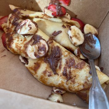 Broken Yolk Cafe - Nutella Crepes with strawberry and banana, and we're taking it home. That's why it's in a box. - Breakfast & Brunch Near Me - Henderson, Nevada Broken Yolk Cafe - Nutella Crepes with strawberry and banana, and we're taking it home. That's why it's in a box. - Breakfast & Brunch Near Me - Henderson, Nevada