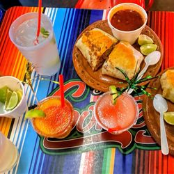 Birrieria y Taqueria Cortez - Sauces, Mango/strawberry margarita w/ tajín rim. Watermelon/lime margarita w/ sugar rum. Burrito Combo with Consomé and limes