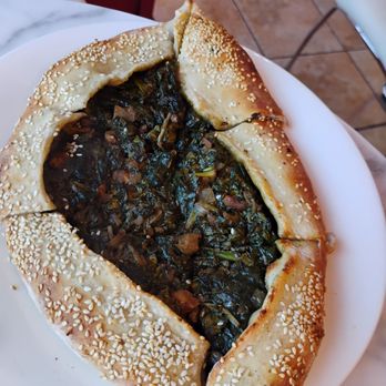 Damask Rose Coffee - Spinach manakeesh (very sour like a pickle) - Coffee & Tea Near Me - Oakland, California