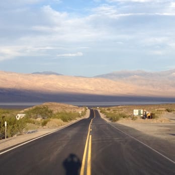 Panamint Springs Resort - Picturesque...standing in the middle of the road during sunset with the mountains glistening in the distance - Hotels Near Me - Darwin, California