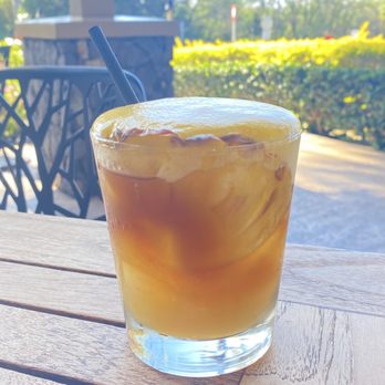 Monkeypod Kitchen by Merriman - Monkeypod Mai Tai  kula organic silver and dark rums, lime, house-made macadamia nut orgeat, bols orange curaçao, honey-lilikoi - New American Near Me - Kihei, Hawaii