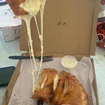 Islice - Cheese Calzone cheeeeeeseeee pulll - Pizza Near Me - Concord, California Islice - Cheese Calzone cheeeeeeseeee pulll - Pizza Near Me - Concord, California