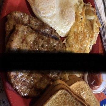 Thrashers Pub & Broiler - 3 egg breakfast with an enormous amount of sausage!!!! (Sorry about the black line!) - American Near Me - Bothell, Washington