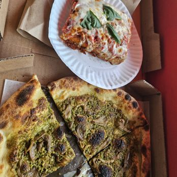 Philomena's - Margherita pizza (top) and pesto mushroom (bottom) - Pizza Near Me - Sunnyside, New York Philomena's - Margherita pizza (top) and pesto mushroom (bottom) - Pizza Near Me - Sunnyside, New York