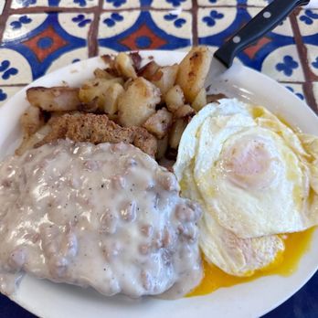 Stadium Diner - Country fried steak with home potatoes and large easy over eggs. Delicious! - Diners Near Me - Miami, Florida Stadium Diner - Country fried steak with home potatoes and large easy over eggs. Delicious! - Diners Near Me - Miami, Florida