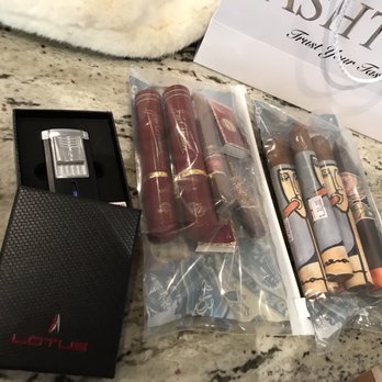 Mandarin Cigar Company - That's a cigar cutter and lighter combo. Pretty awesome and they clean and fill it whenever you want as a service for free - Tobacco Shops Near Me - Jacksonville, Florida Mandarin Cigar Company - That's a cigar cutter and lighter combo. Pretty awesome and they clean and fill it whenever you want as a service for free - Tobacco Shops Near Me - Jacksonville, Florida