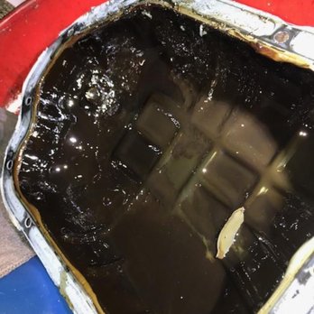 DriveTime Used Cars - Oil pan of car DriveTime sold under the pretense of being in "good condition." - Used Car Dealers Near Me - Downey, California