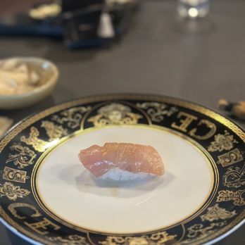 Omakase By Aung - yellowtail with orange zest - Sushi Bars Near Me - Honolulu, Hawaii