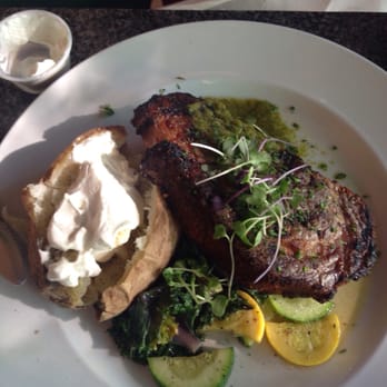 Rogues Harbor Inn - 12oz cowboy steak with seasonal veg, baked potato and chimichuri sauce. - Hotels Near Me - Lansing, New York
