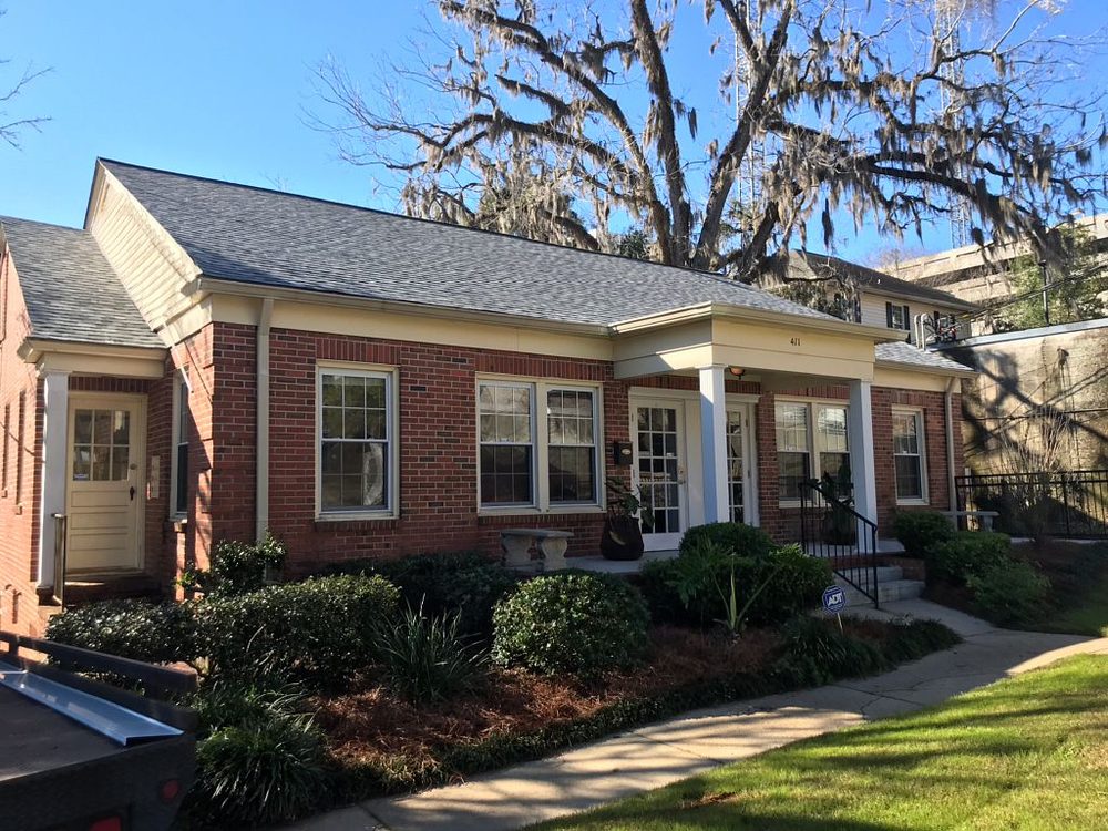 Slide of Tadlock Roofing