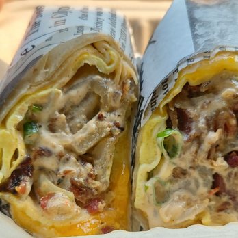 Uptown Cafe - Burrito. $9 was mostly potatoes...... - Coffee & Tea Near Me - Chantilly , Virginia