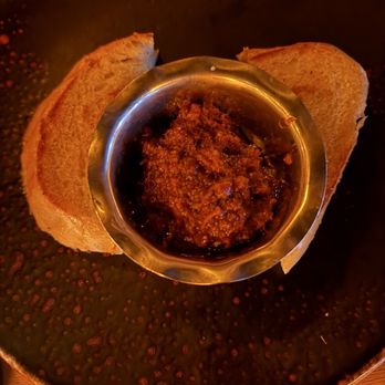 Primal Steakhouse - Bread w/ tomato spread - Steakhouses Near Me - The Colony, Texas Primal Steakhouse - Bread w/ tomato spread - Steakhouses Near Me - The Colony, Texas