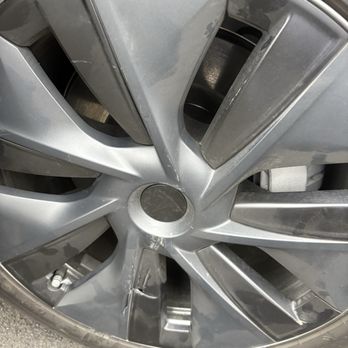 Fix Auto Modesto - City Center - Damaged rim cover photo - Windshield Installation & Repair Near Me - Modesto, California Fix Auto Modesto - City Center - Damaged rim cover photo - Windshield Installation & Repair Near Me - Modesto, California
