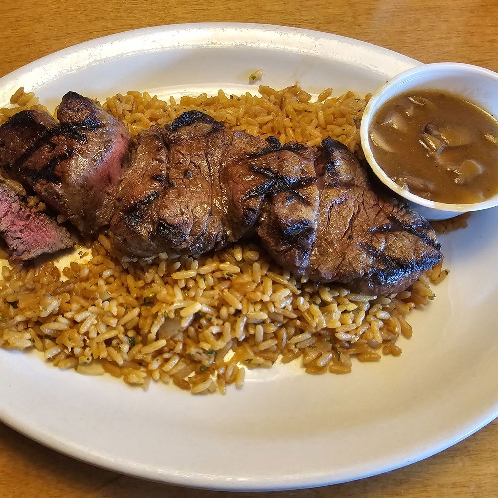 Texas Roadhouse - Filet medallions with mushroom sauce and rice. - Steakhouses Near Me - Manchester, Connecticut Texas Roadhouse - Filet medallions with mushroom sauce and rice. - Steakhouses Near Me - Manchester, Connecticut