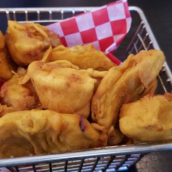 Moksha Indian Bistro - Vegetable pakora (C$7). Pretty darn good. Savory and lightly breaded with a wonderful spicy green dipping sauce. - Indian Near Me - Niagara Falls, Ontario