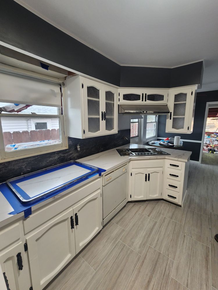 Slide of Four A's Remodeling & Construction