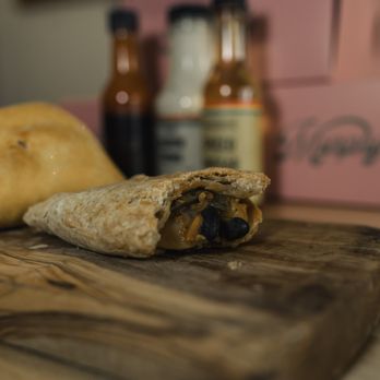 Murphy’s - a burrito on a cutting board - Coffee & Tea Near Me - New York, New York Murphy’s - a burrito on a cutting board - Coffee & Tea Near Me - New York, New York