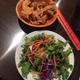 Ginger salad and fried wontons that come with the lunch entrees Ginger salad and fried wontons that come with the lunch entrees