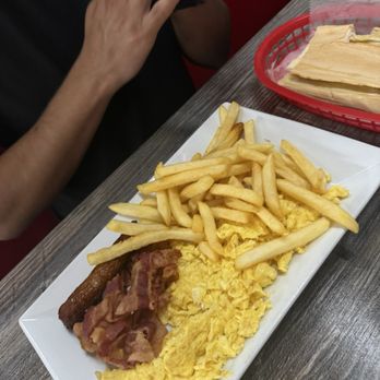 El Rinconcito Latino - Scrambled eggs with bacon, sausage, and fries - Cuban Near Me - Miami, Florida El Rinconcito Latino - Scrambled eggs with bacon, sausage, and fries - Cuban Near Me - Miami, Florida