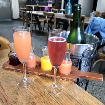 Roe Seafood Restaurant - Champagne bottle with 4 juice - Seafood Near Me - Long Beach, California