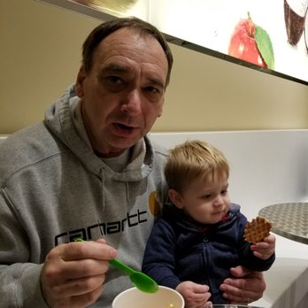 Yo'Belle - a man and a child eating ice cream - Ice Cream & Frozen Yogurt Near Me - Napa, California Yo'Belle - a man and a child eating ice cream - Ice Cream & Frozen Yogurt Near Me - Napa, California