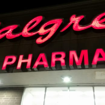 Walgreens - a pharmacy sign lit up at night - Drugstores Near Me - Malden, Massachusetts