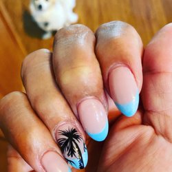 Ruby's Nails - Wanted Hawaiian design for my Retirement Luau and Mindy designed this freehand. She made sure my nails were perfect for my event.