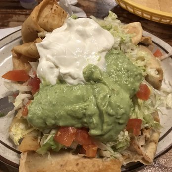 El Tapatio - This is more like an open chimichanga. Its beef & asked to add beans inside. That's how I'm used to a chimichanga & this didn't disappoint - Mexican Near Me - Porterville, California