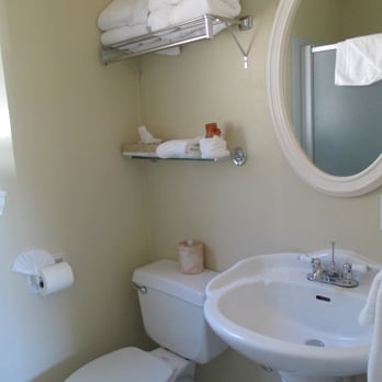 Castle Inn - This is the only shelving or counter space in the bathroom........cute, but very small. - Hotels Near Me - Cambria, California Castle Inn - This is the only shelving or counter space in the bathroom........cute, but very small. - Hotels Near Me - Cambria, California