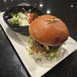 The black and blue hamburger with a side salad of blue cheese topping I could not put the burger down. I ate it in one fell swoop. The black and blue hamburger with a side salad of blue cheese topping I could not put the burger down. I ate it in one fell swoop.