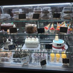 Baskin Robbins - Cakes and look at the mango bar on the bottom right!