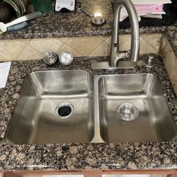 TOP Handyman Services - Replacement under-mount sink with new faucet.