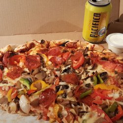 Marlin Pizzas - Great take-out pizza in Todos Santos. We like the family size vegetarian and we ask them to add pepperoni. Takes approx. 20 min. Yum!