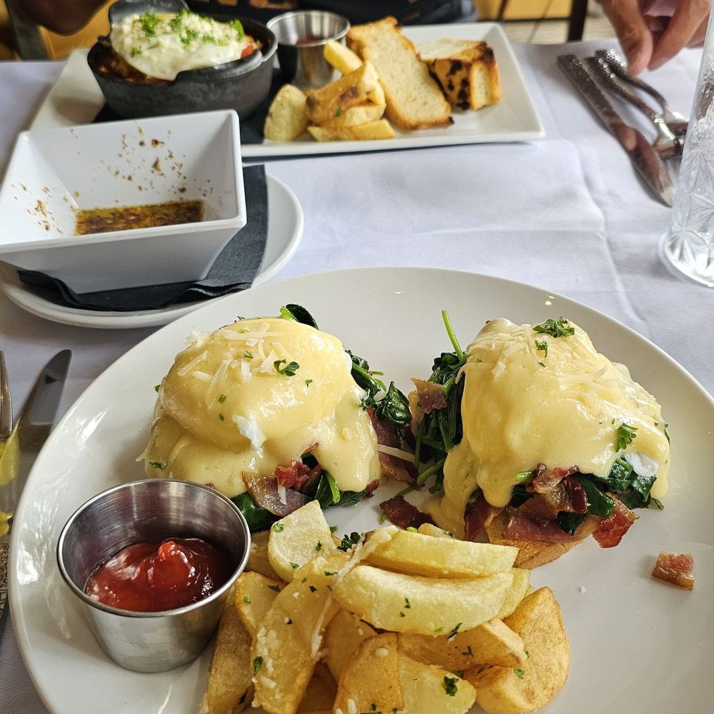 Epicure's Brunch menu- Eggs Benedict and Sausage/egg skillet