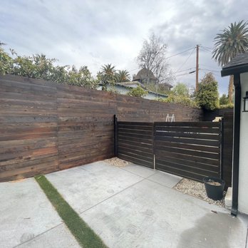 Evo Building Solutions - Finished fence - Decks & Railing Near Me