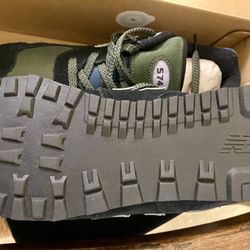 J & M Sneakers - No r in a circle next to the New Balance name on the sole - which is on Every sneaker NB has Ever made.