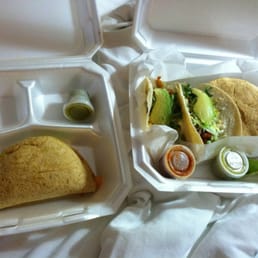 Empanada on left and tacos/gordita on right Empanada on left and tacos/gordita on right