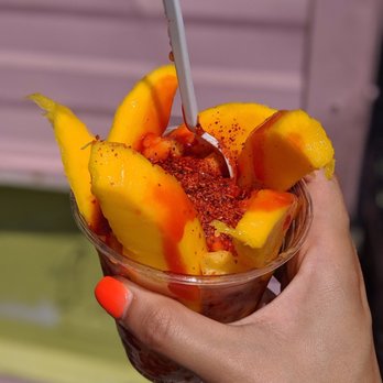 Rosita Snacks - a person holding a bowl of fruit - Desserts Near Me - Akron, Ohio Rosita Snacks - a person holding a bowl of fruit - Desserts Near Me - Akron, Ohio