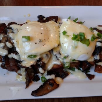 Yolks - Eggs on lemon-truffle hash with portabello mushrooms - Breakfast & Brunch Near Me - Vancouver, British Columbia Yolks - Eggs on lemon-truffle hash with portabello mushrooms - Breakfast & Brunch Near Me - Vancouver, British Columbia