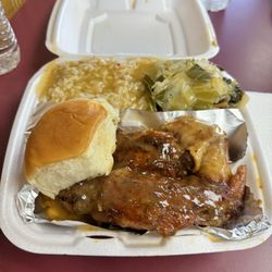 TyeMeka's Soul Food - Turkey wings with gravy, a roll, rice and gravy, cabbage mixed with collard greens and smoked turkey. Love in a platter!